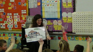 Elena Proakis Ellis discusses household water use with a group of first graders.