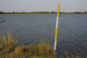 Pole measuring water levels in dams